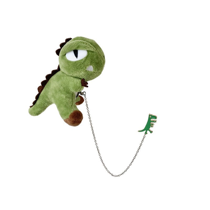 Toy dinosaur brooch