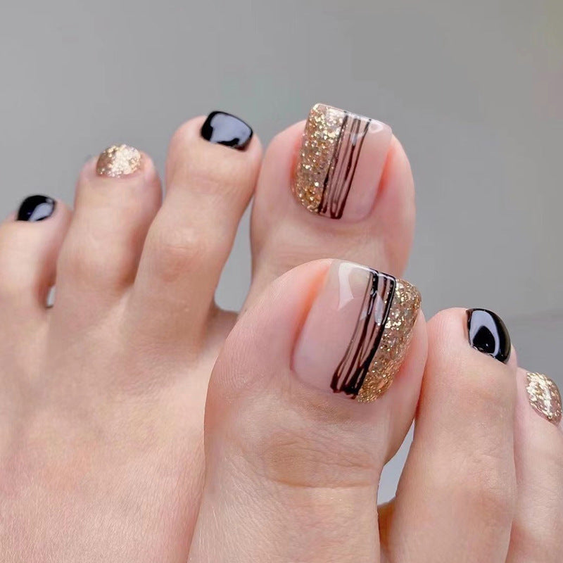 Toe nail black gold enhance